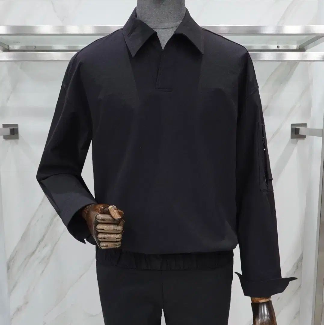 liberclaazy 黒 ウーブン ポケット ポロTシャツ 105