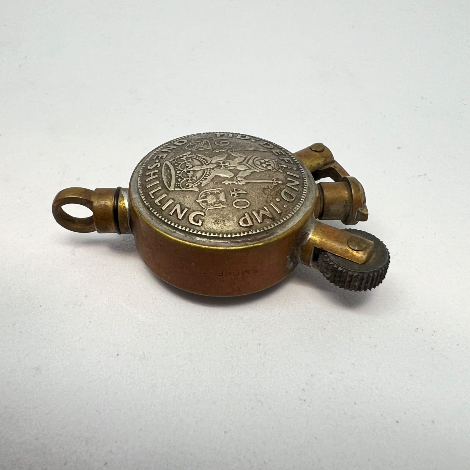 ジョン・F・ケネディ リバティーコイン型 オイルライター - メルカリ コイン型オイルライター