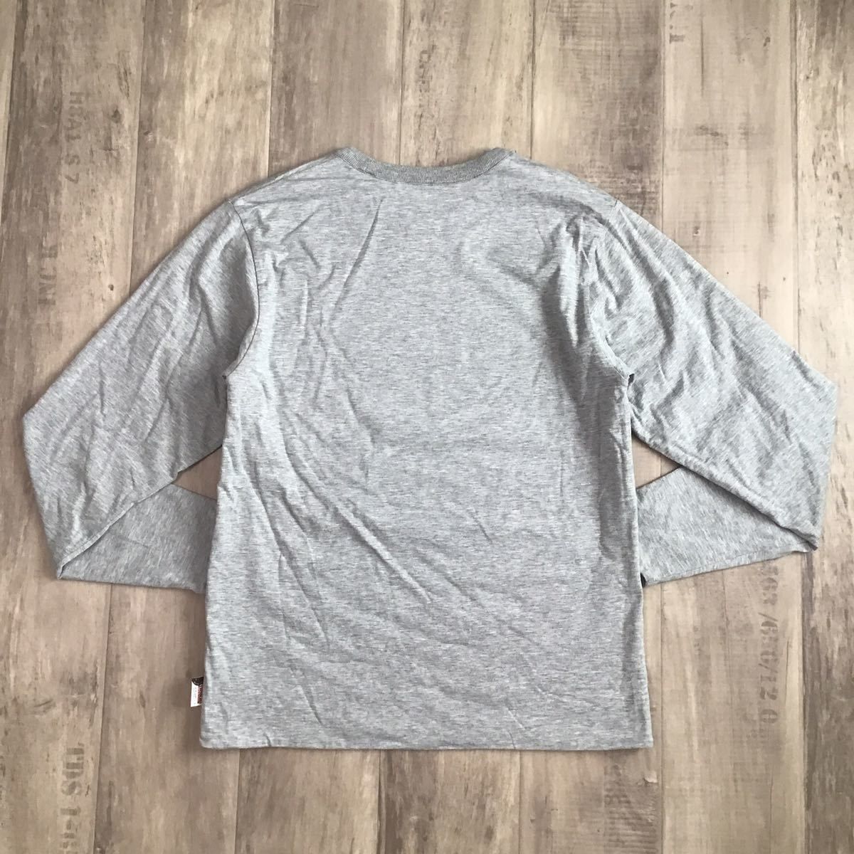エイプ　マイロ✖️カウズ長袖Tシャツ ☆リバーシブル☆ KAWS MILO 長袖 Tシャツ Mサイズ a bathing