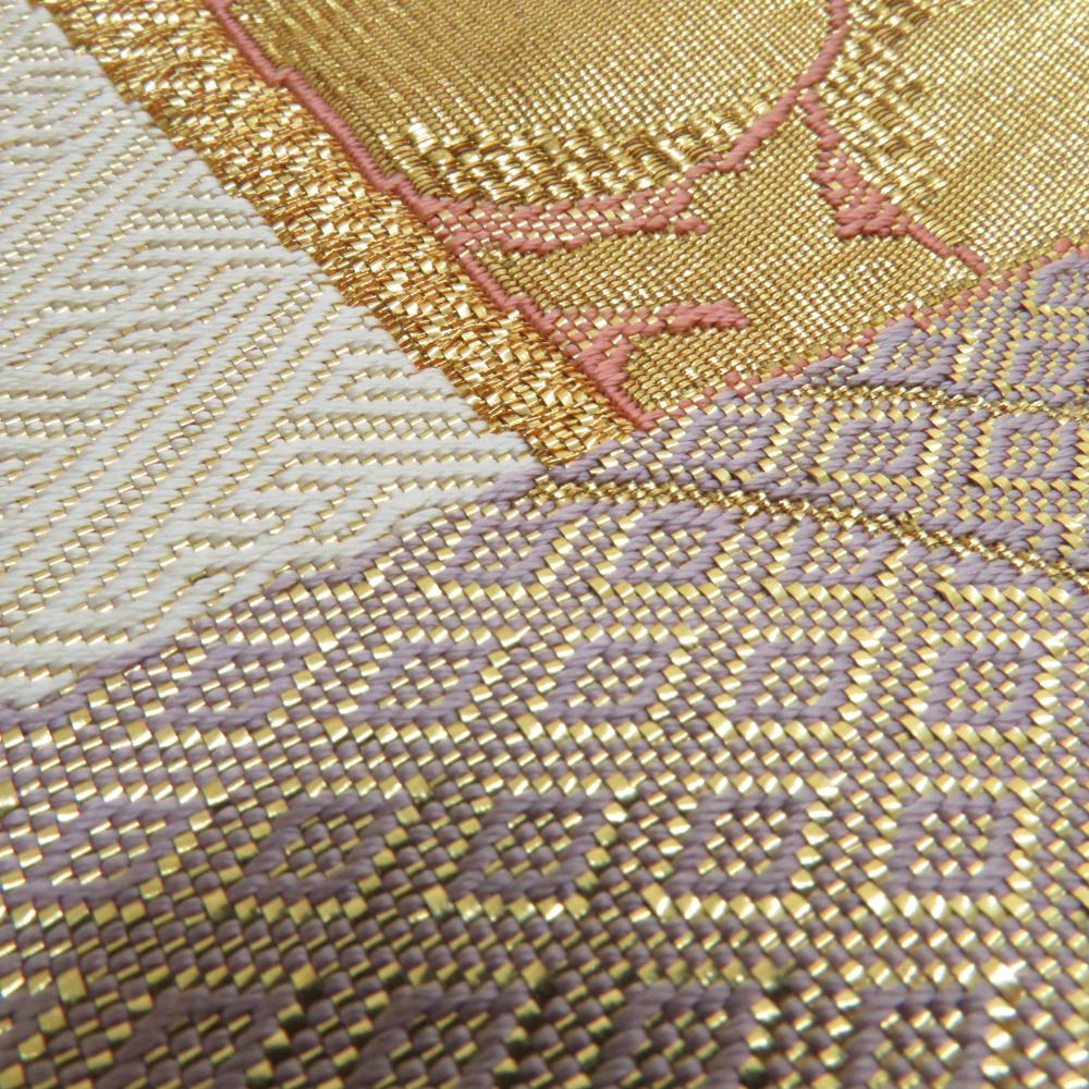 袋帯 岡野武武一郎 本綾佐賀野錦 紗綾形に花や鶴など 金x白xオレンジ