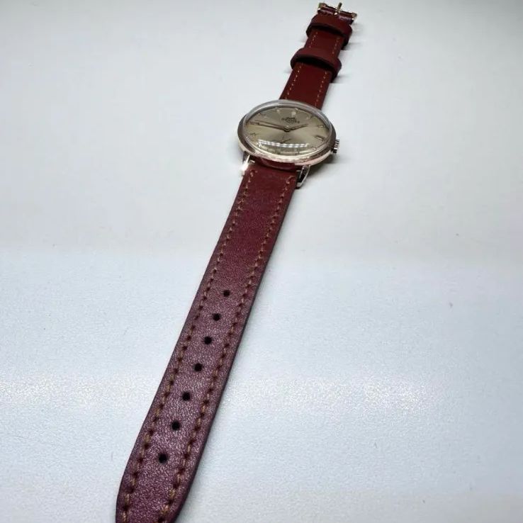 ヴィンテージ エルメスHERMES ゴールド文字盤 手巻き ユニ