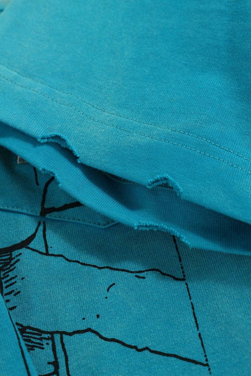 サンクアンズ SKZU22AW0TS0301 フェード・ダメージ加工プリントTシャツ  