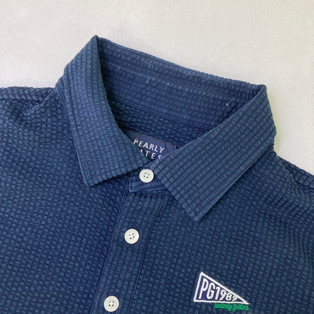 新品 パーリーゲイツ 半袖 シアサッカー ポロシャツ 4 M ネイビー 総柄 新品 パーリーゲイツ 半袖 シアサッカー ポロシャツ 4 M ネイビー 総柄