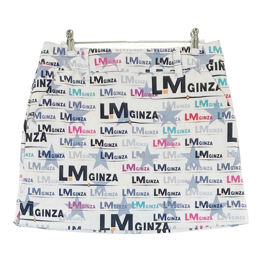 サイズ：L LOUD MOUTH ラウドマウス  インナー付 スカート LM GINZA 英字総柄 ホワイト系 [240101307285]# ゴルフウェア レディース ストスト