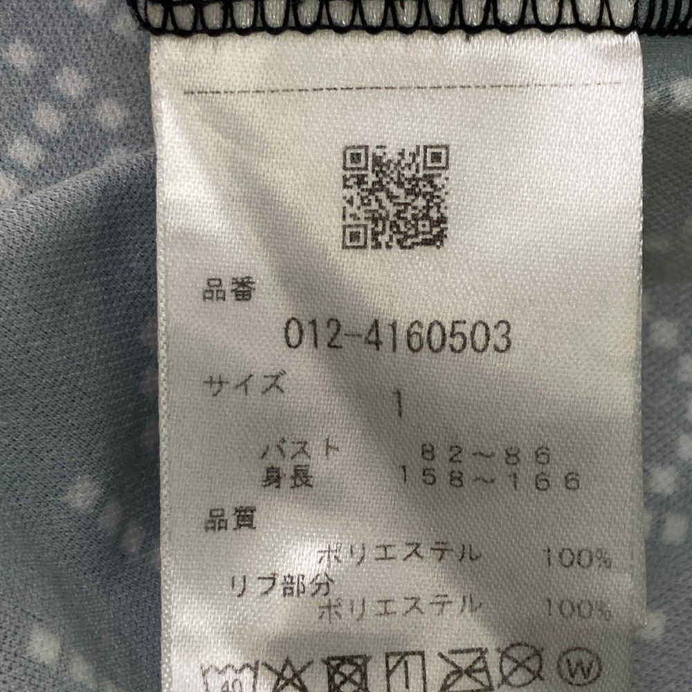 半袖ポロシャツ ロゴ総柄
