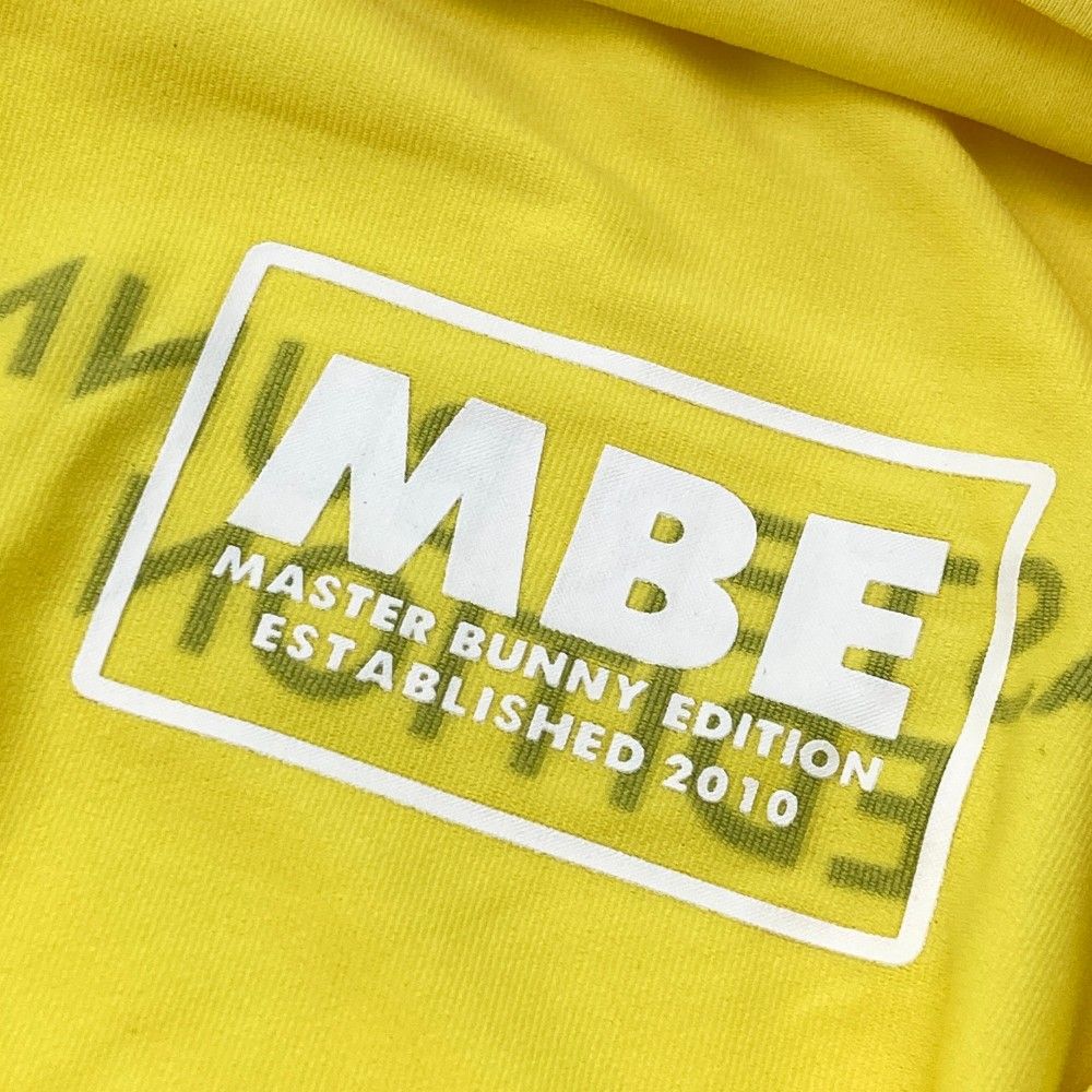 サイズ：0 MASTER BUNNY EDITION マスターバニーエディション  半袖ハイネックTシャツ  イエロー系 [240101446252] ゴルフウェア レディース ストスト サイズ：0 MASTER BUNNY EDITION マスターバニーエディション