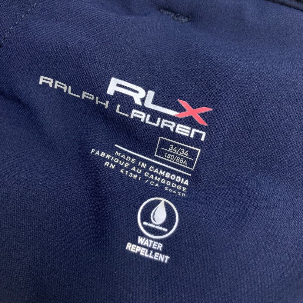サイズ：34 RLX ラルフローレン  中綿パンツ  ネイビー系 [240101455035] ゴルフウェア メンズ ストスト サイズ：34 RLX ラルフローレン 中綿パンツ ネイビー系