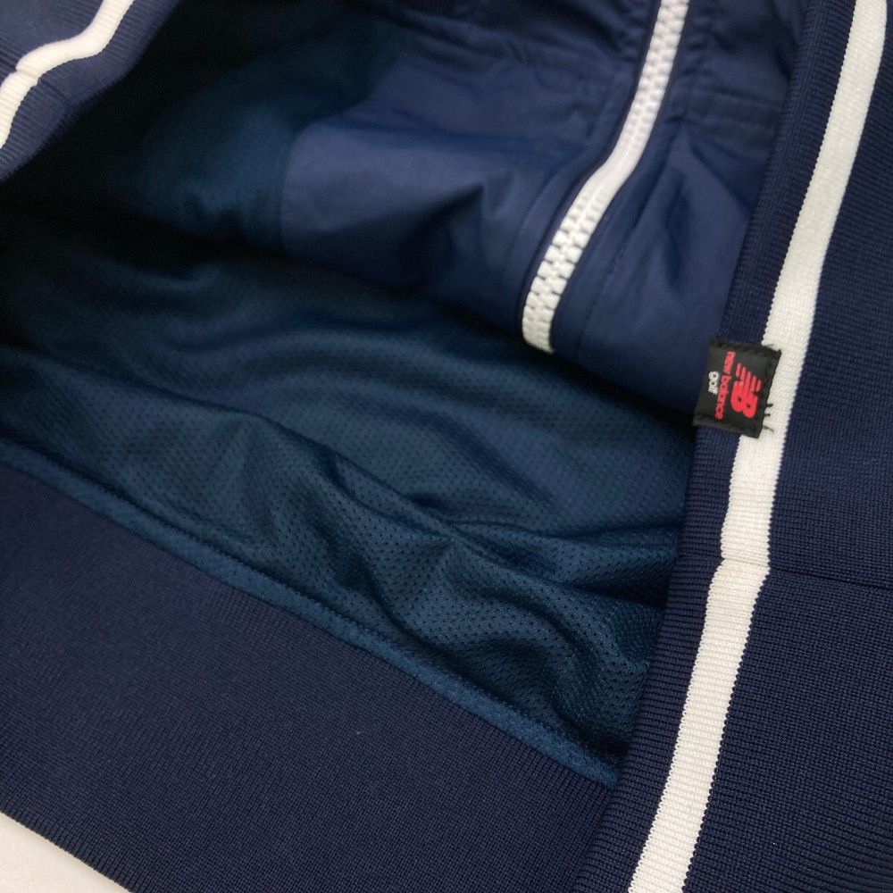 サイズ：0 NEW BALANCE GOLF ニューバランス  フード付きジップジャケット 総柄 ネイビー系 [240001228180] ゴルフウェア レディース ストスト サイズ：2 NEW BALANCE GOLF ニューバランス フード付 ジップ