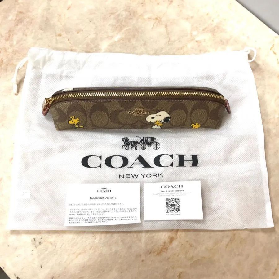 COACH コーチ × PEANUTS ピーナッツ SNOOPY ペンケース ブラウン系