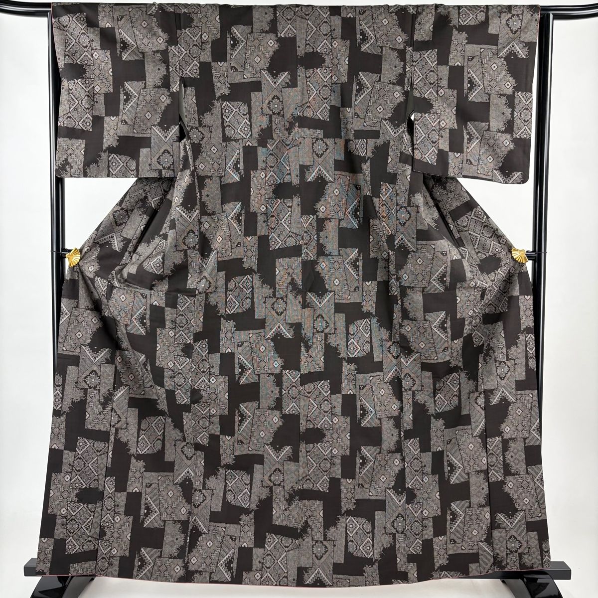 紬 身丈164cm 裄丈64.5cm M 袷 菱 幾何学 焦茶色 正絹