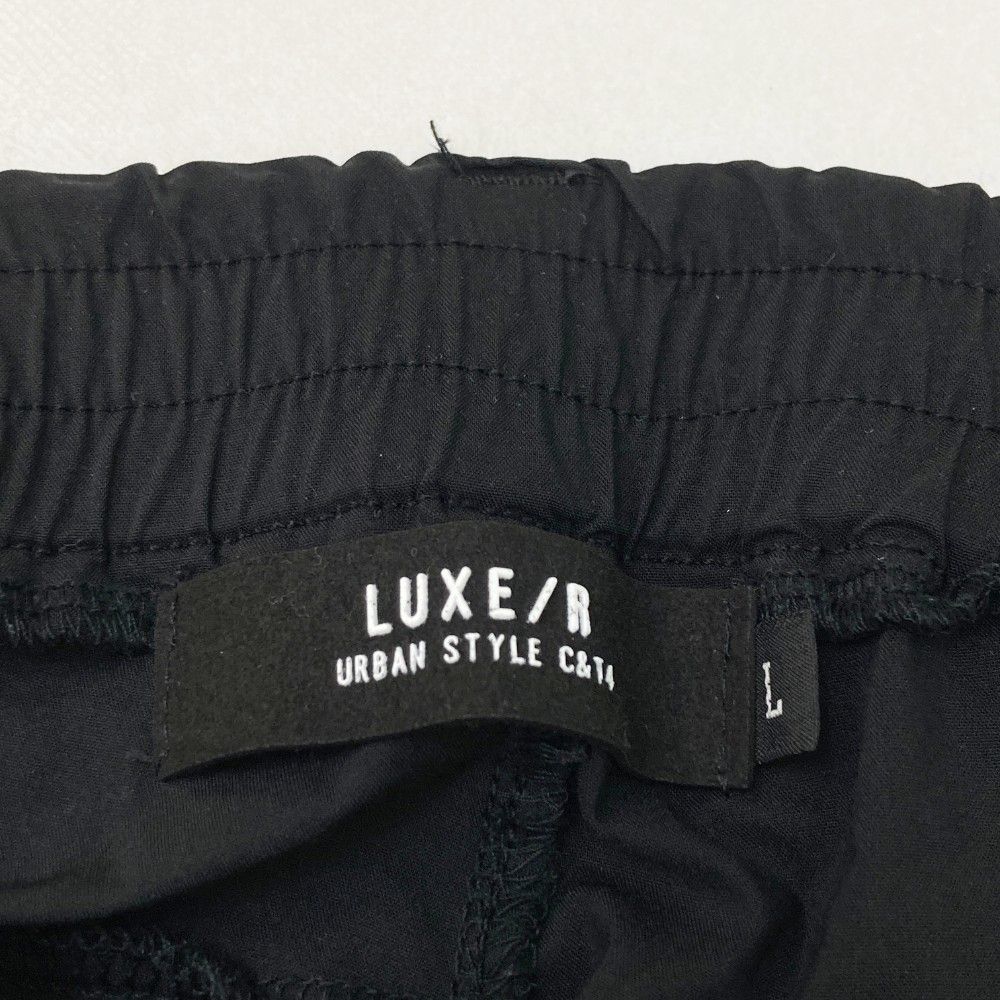 サイズ：L LUXE/R ラグジュ  ジョガーパンツ  ブラック系 [240101413322] ゴルフウェア メンズ ストスト サイズ：L LUXE/R ラグジュ ジョガーパンツ ブラック系