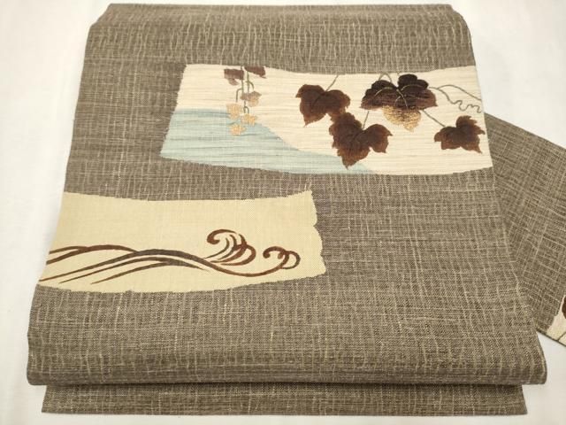 平和屋着物○九寸名古屋帯 紬地 柿渋染め 蔦の葉文 金糸 正絹 逸品  