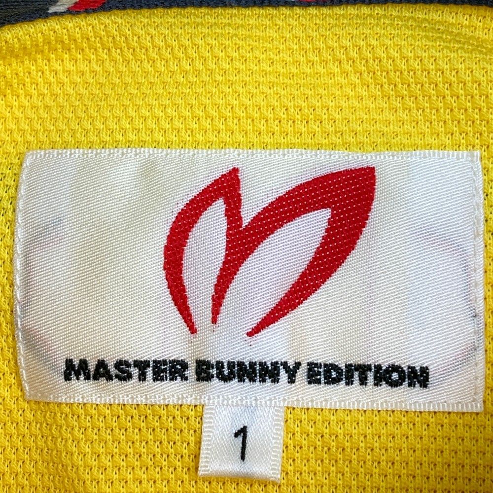 サイズ：5 MASTER BUNNY EDITION マスターバニーエディション  半袖ポロシャツ ワッペン  イエロー系 [240101420475] ゴルフウェア メンズ ストスト MASTER BUNNY EDITION マスターバニーエディション 半袖
