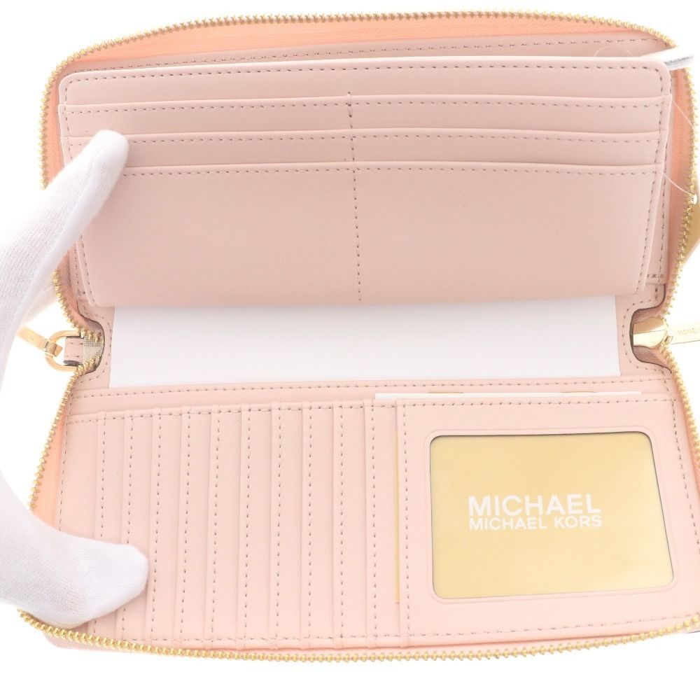 新品未使用　MICHAEL KORS ピンク 長財布 ストラップ付き 1078001426265135_01_4888w.jpeg