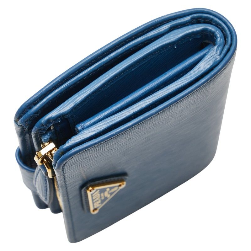 ✨未使用展示品✨　PRADA 長財布　サフィアーノレザー　三角プレート　刻印 PRADA プラダ 長財布 ラウンドファスナー 三角ロゴプレート