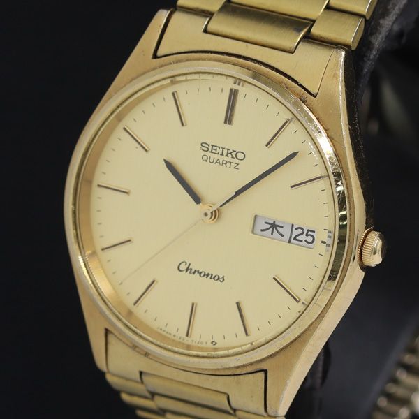 セイコー クロノス 8123-7080 QZ ゴールド文字盤 デイデイト メンズ