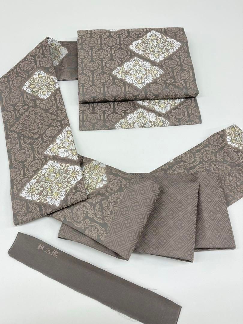 錦唐織 九寸名古屋帯 新品未使用品 菊 金糸 銀糸 正絹 - メルカリ