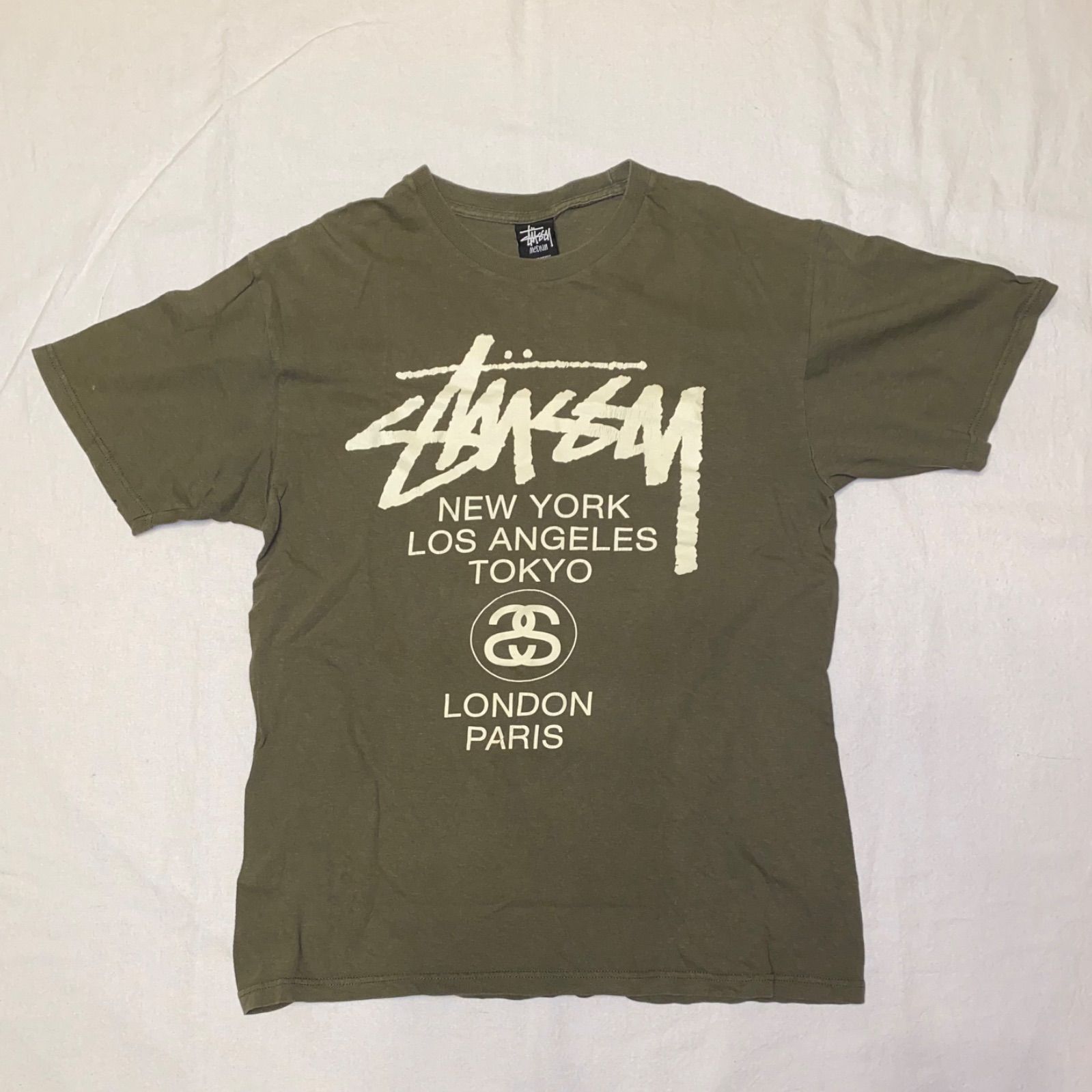 STUSSY ワールドツアープリント Tシャツ - メルカリ