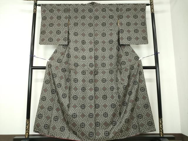 平和屋着物○本場大島紬 龍郷絣 本場大島紬 花菱文 正絹 逸品 未使用  