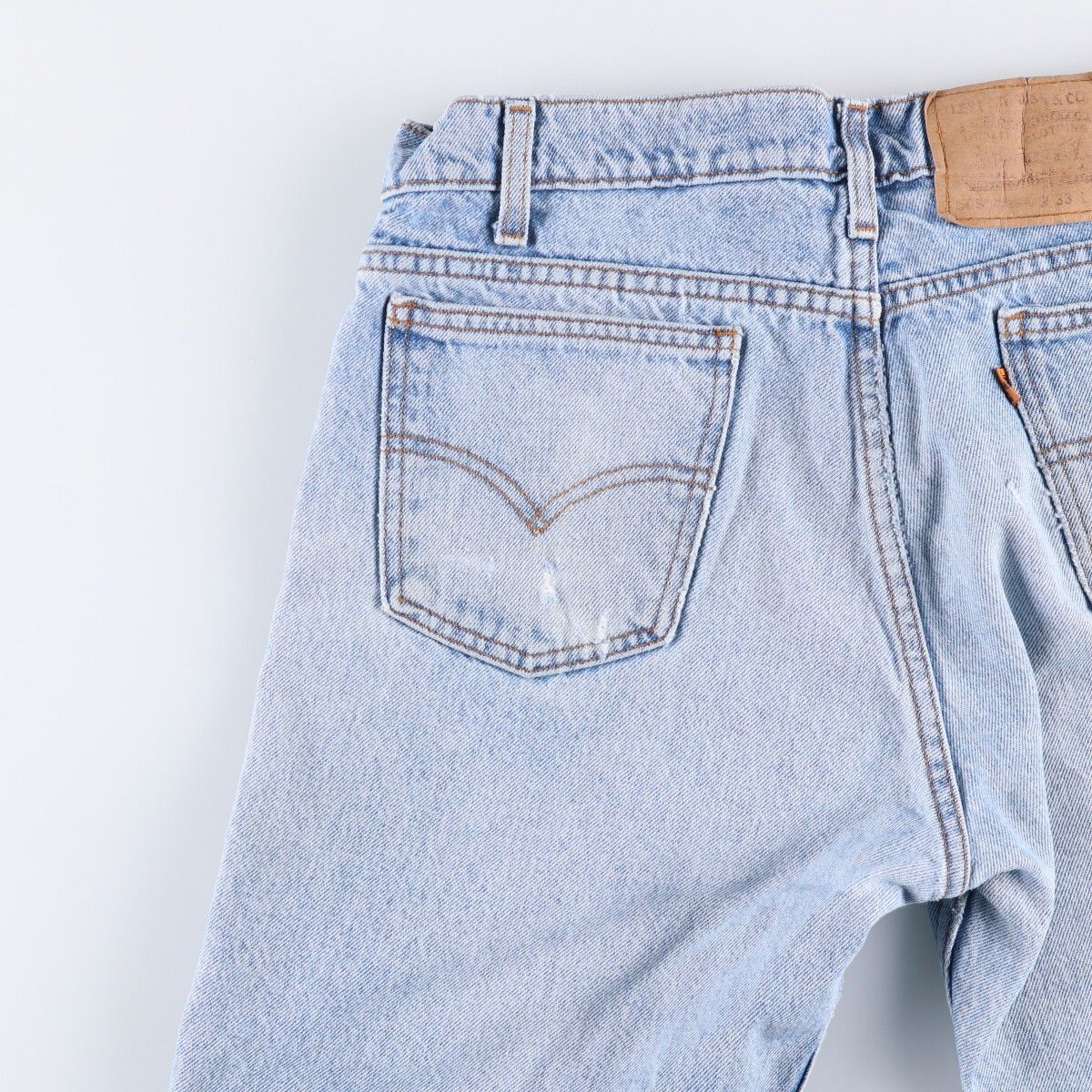 テーパードデニムパンツ