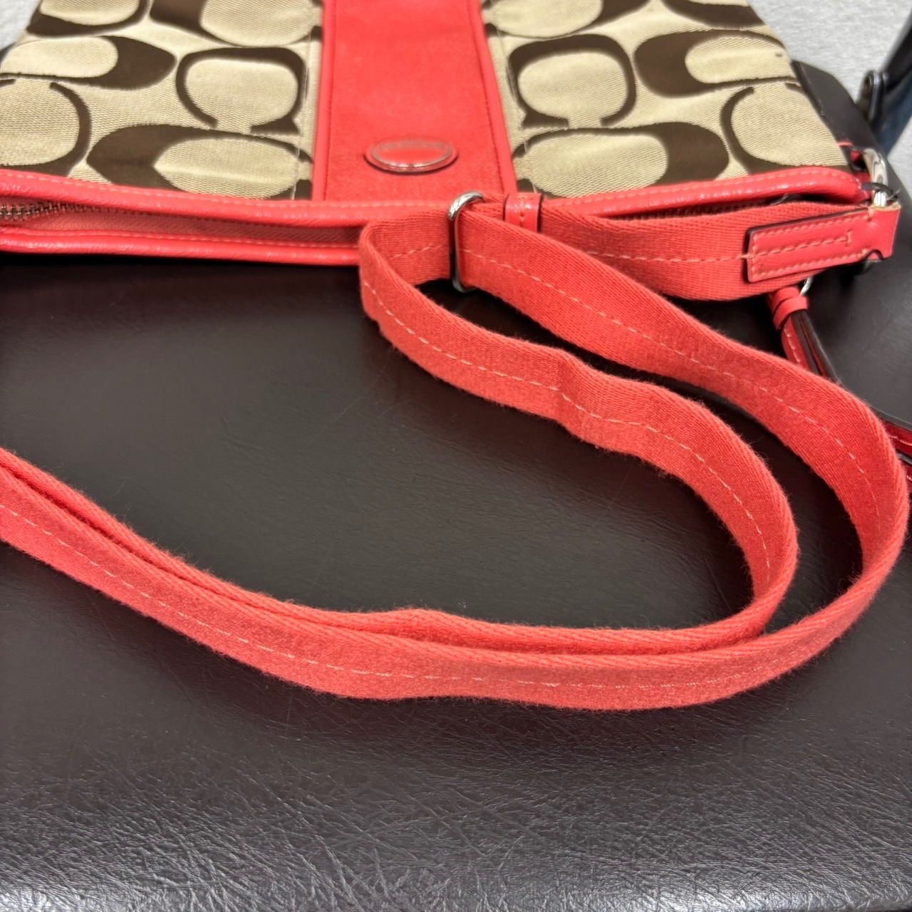 COACH ショルダーバッグ シグネチャー キャンバス コーラル