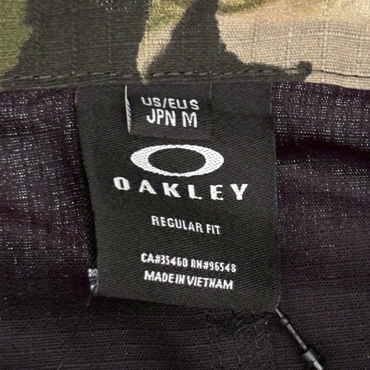 未使用 OAKLEY オークリー アノラックパーカー 緑 黒 ビックポケット 