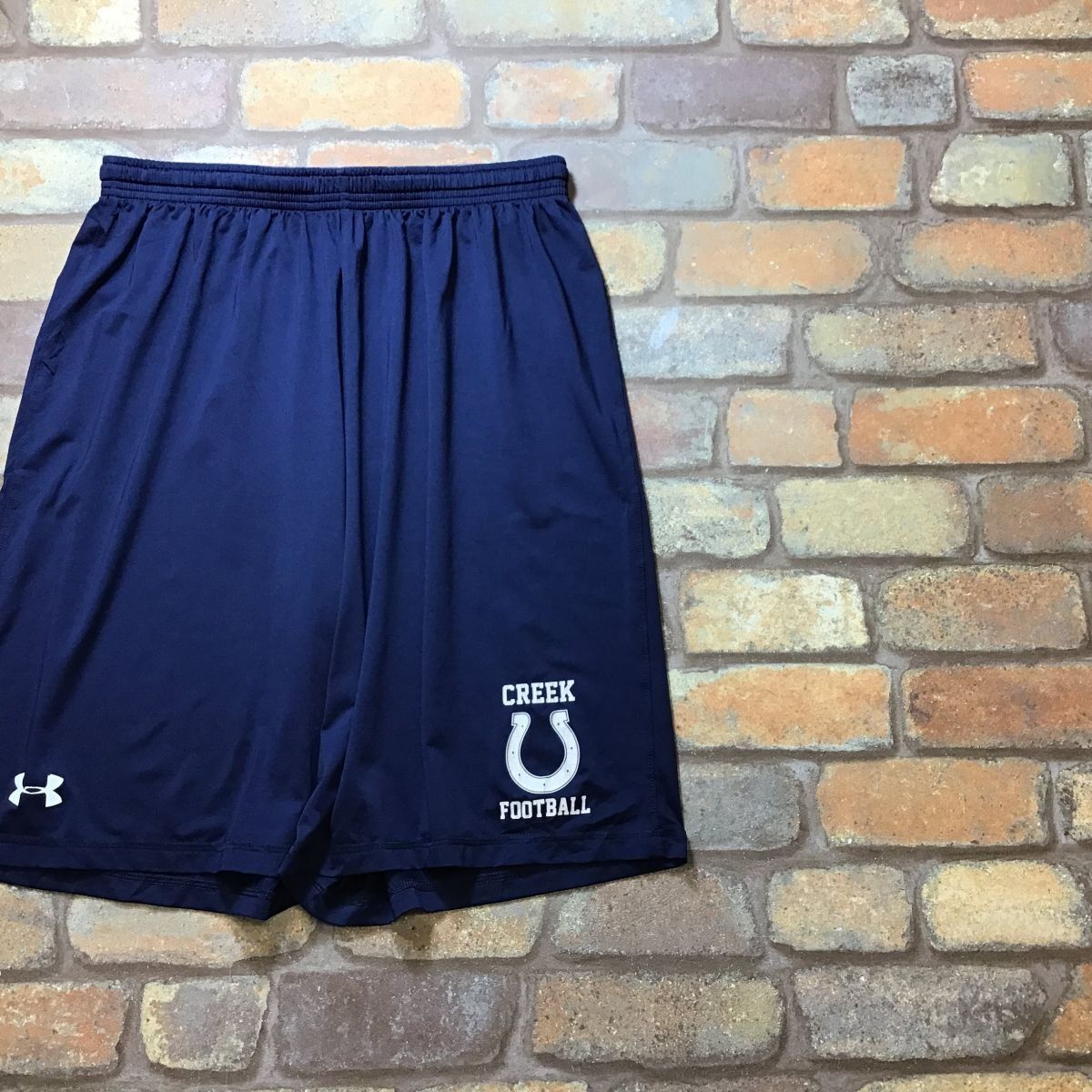 SP1-329★USA限定★吸湿速乾★ネイビー【UNDER ARMOUR アンダーアーマー】HEATGEAR カレッジ ショートパンツ【メンズ L】アメフト スポーツ