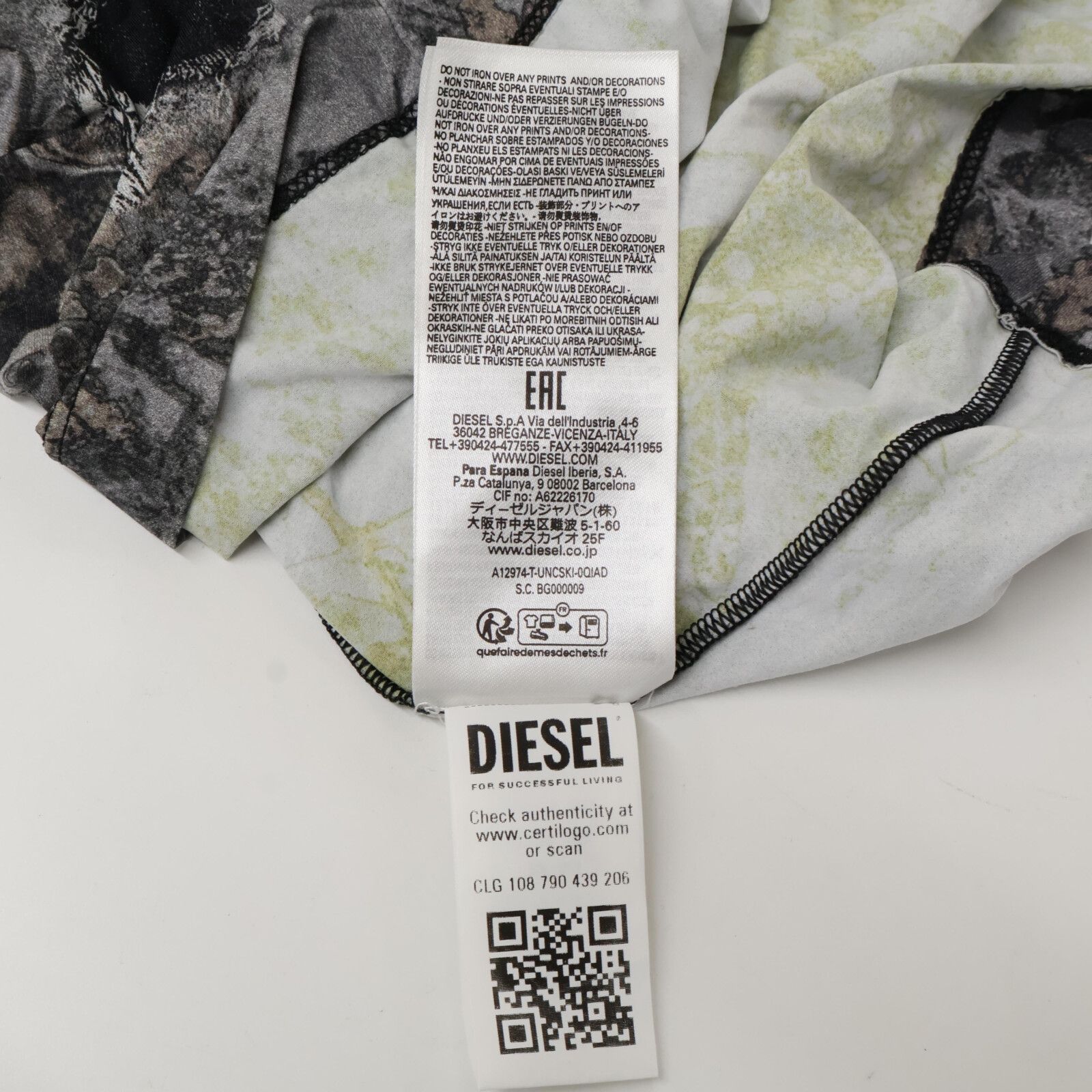 今年の新作から定番まで！ ディーゼル DIESEL 美品 L Tシャツ 総柄 A12974-T-UNCSKI-0QIAD Tシャツ(半袖+袖なし)