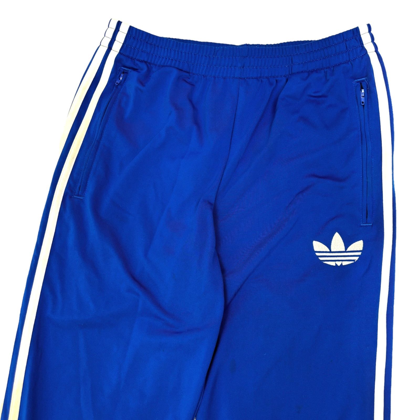 adidas アディダス トラックパンツ トレフォイルロゴ 3ライン ブルー adidas（アディダス）の「アディカラー 3Dトレフォイル 3