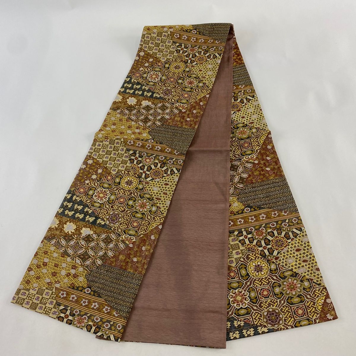 たつむら 「ろうけつ華文」金色花柄 袋帯 製品カテゴリ 帯 - 龍村美術