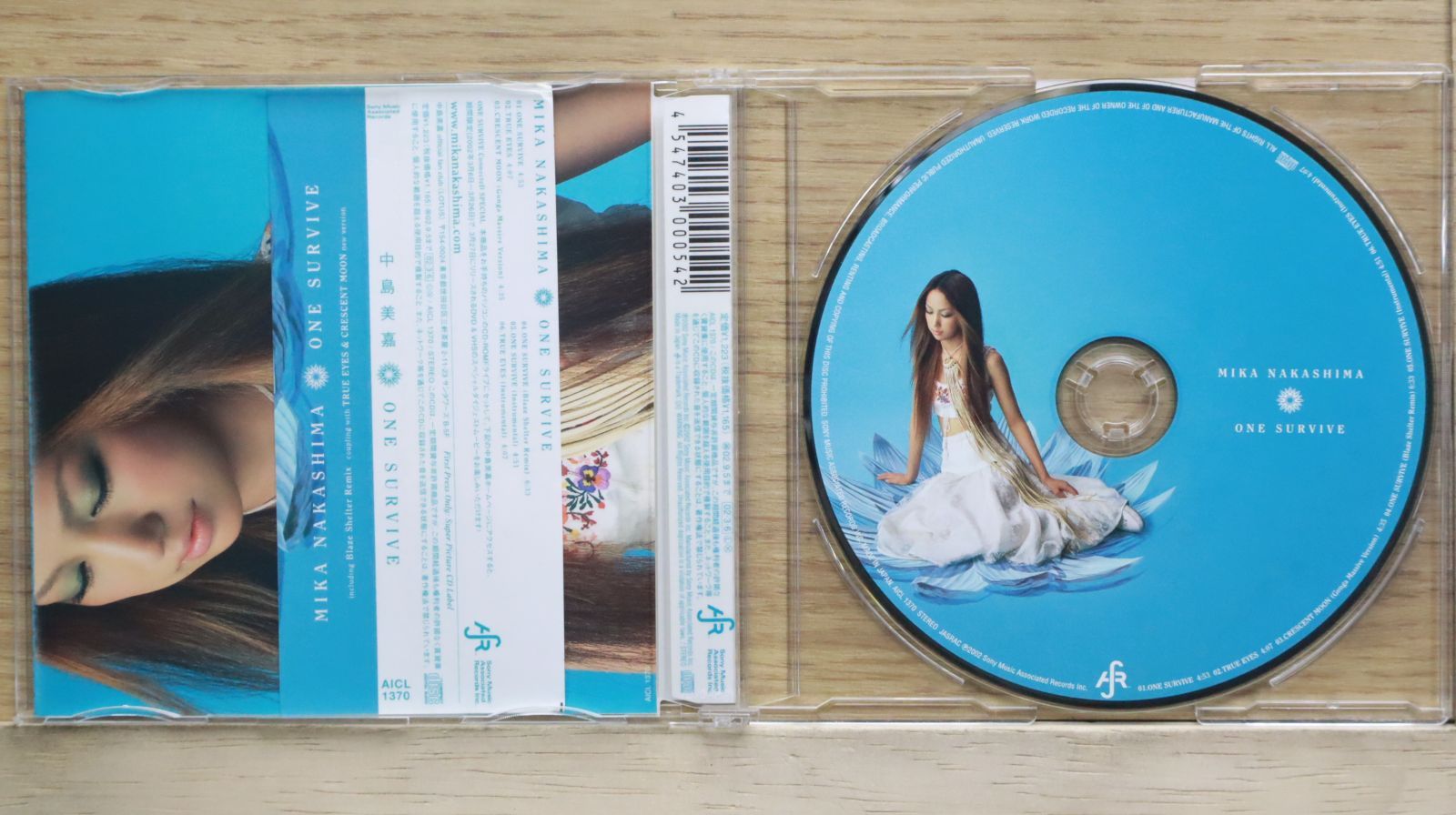 中島美嘉 One Survive レコード 3rdシングル Amazon.co.jp: ONE SURVIVE: ミュージック