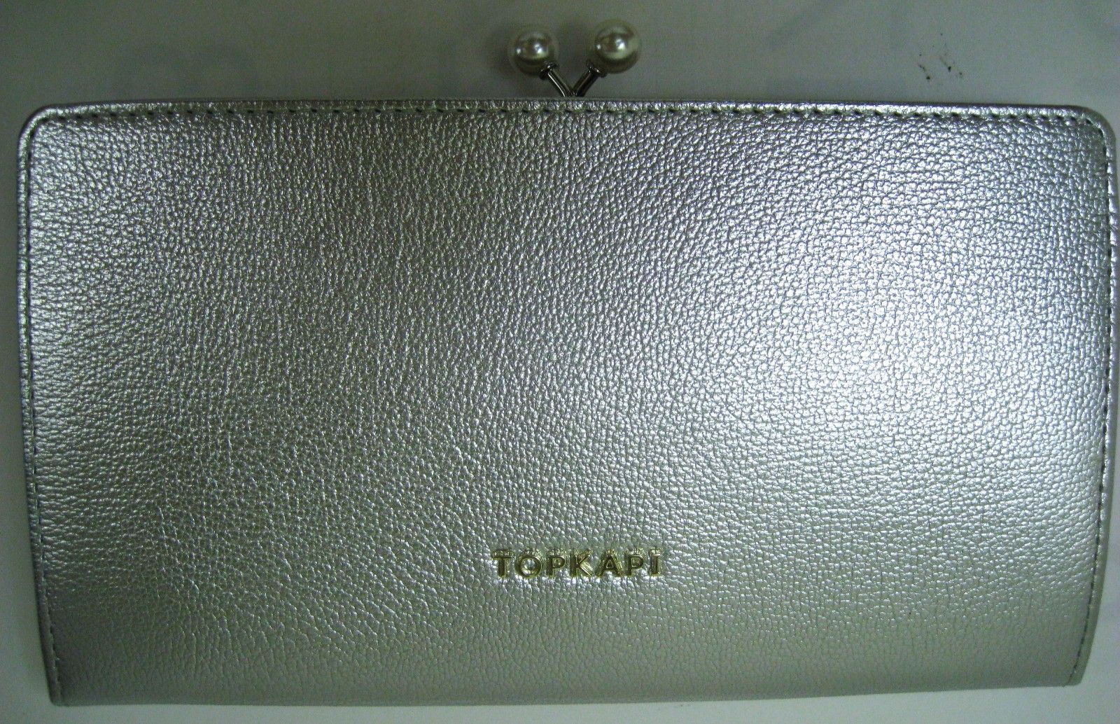 ほぼ未使用トプカピTOPKAPI牛革ガマグチシルバー内側ピンク定価27,500円 ほぼ未使用トプカピTOPKAPI牛革ガマグチシルバー内側ピンク定価
