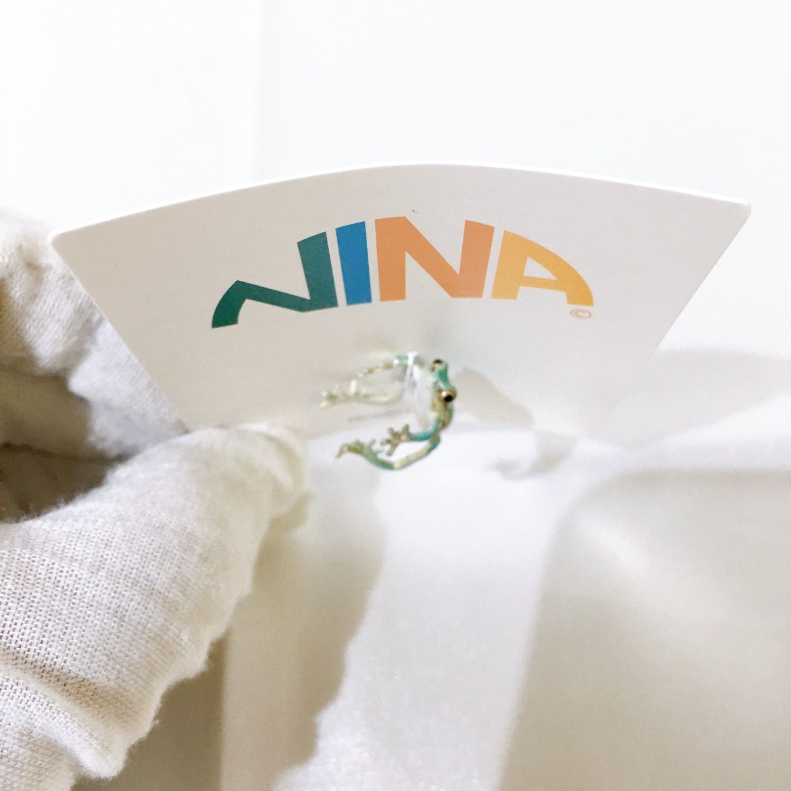 美品】nina 青いアマガエル イヤーカフ レディース - メルカリ