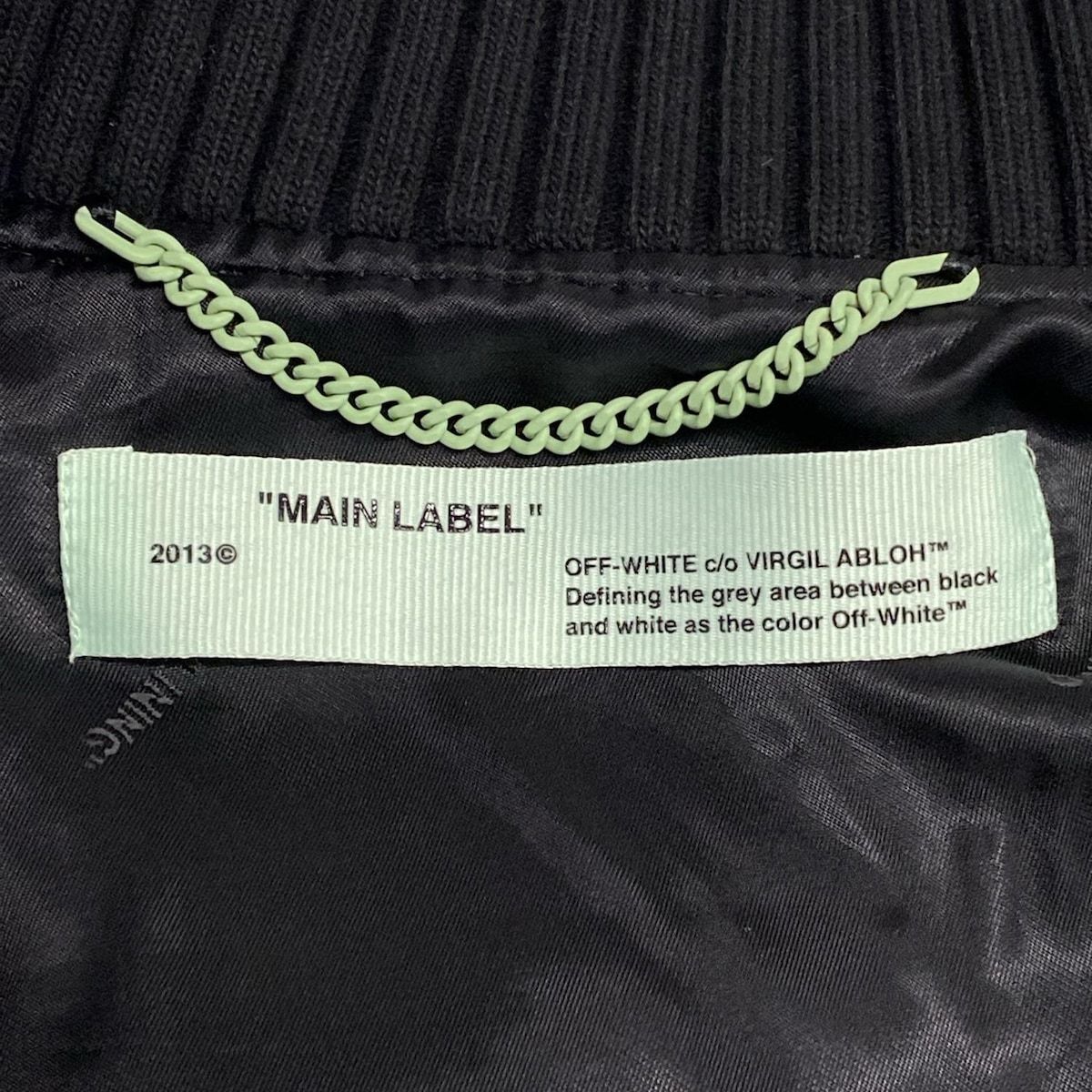 オフホワイト ブルゾン サイズM メンズ スキニーバーシティ  