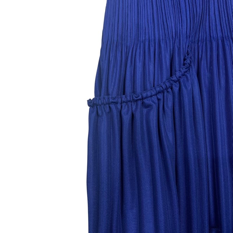 PLEATS PLEASE