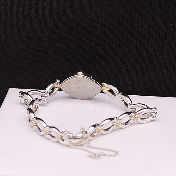 稼働 良品 セイコー QZ 2P20-5990 ひし形 シルバー文字盤 レディース