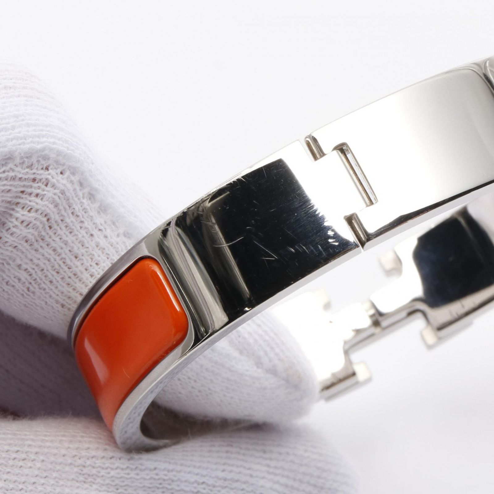エルメス　バングル　オレンジ、ステンレス エルメス HERMES バングル オレンジ/シルバー ステンレススチール