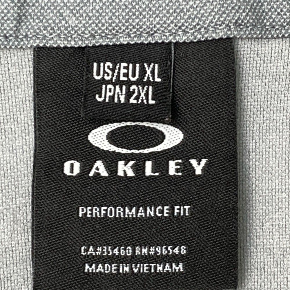 サイズ：2XL OAKLEY オークリー  袖刺繍 長袖ジップジャケット  グレー系 [240101443107] ゴルフウェア メンズ ストスト サイズ：2XL OAKLEY オークリー 袖刺繍 長袖ジップジャケット