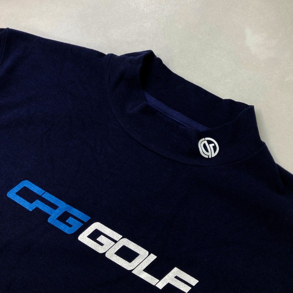 サイズ：4 CPG GOLF シーピージーゴルフ  ハイネック 長袖Tシャツ 起毛 ロゴ  ネイビー系 [240101453282] ゴルフウェア メンズ ストスト サイズ：4 CPG GOLF シーピージーゴルフ ハイネック 長袖Tシャツ