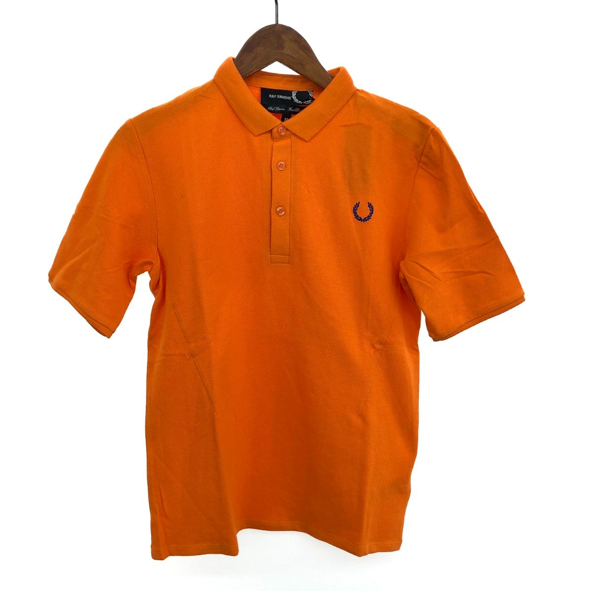 RAF SIMONS / ポロシャツ Raf Simons logo-plaque Cotton Polo Shirt | Black | FARFETCH