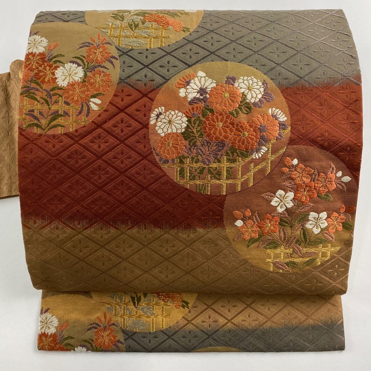 名古屋帯 秀品 丸文 草花 金糸 箔 赤茶 正絹 【中古】 - メルカリ