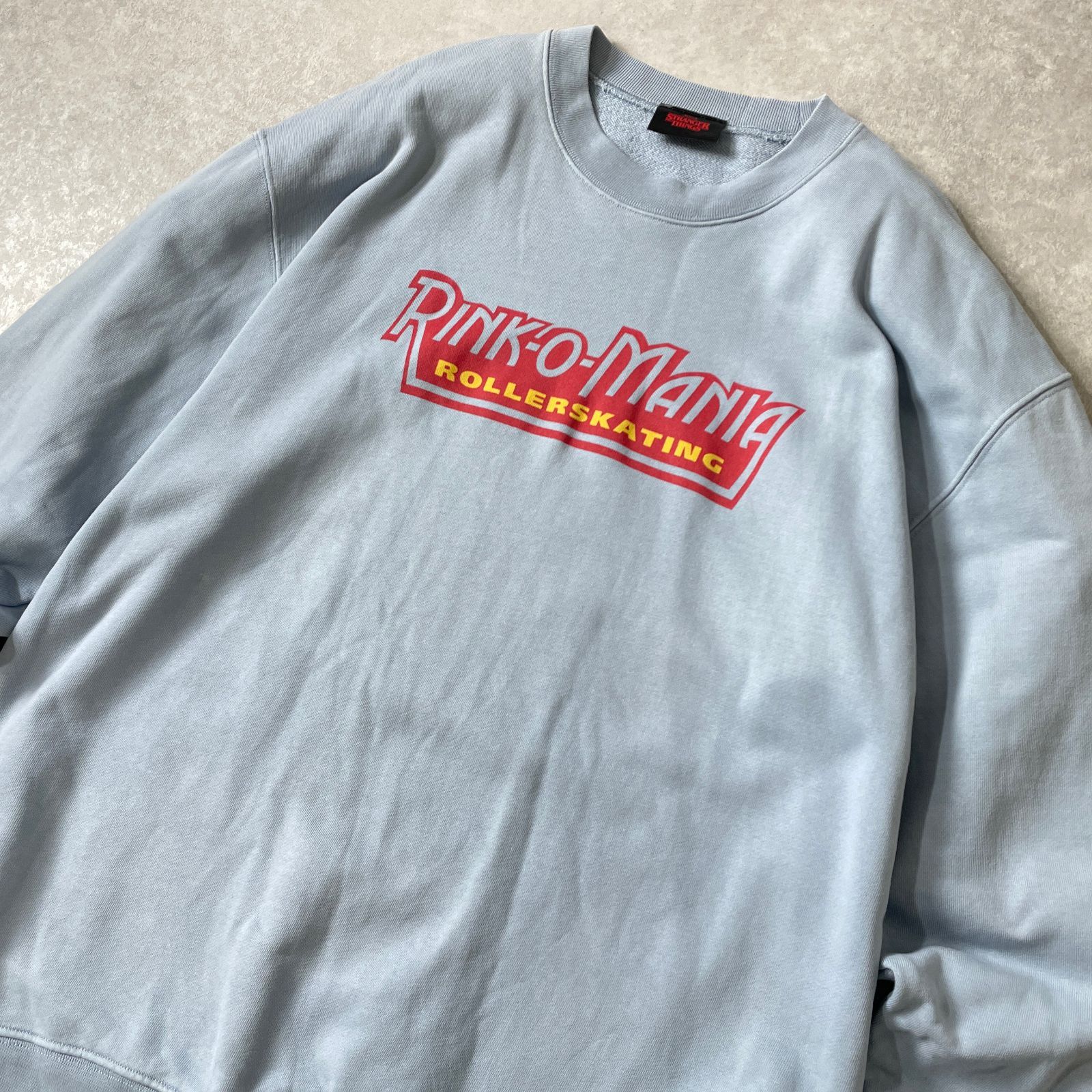 STRANGER THINGS PINK-O-MANIA プリント スウェット ネットフリックス