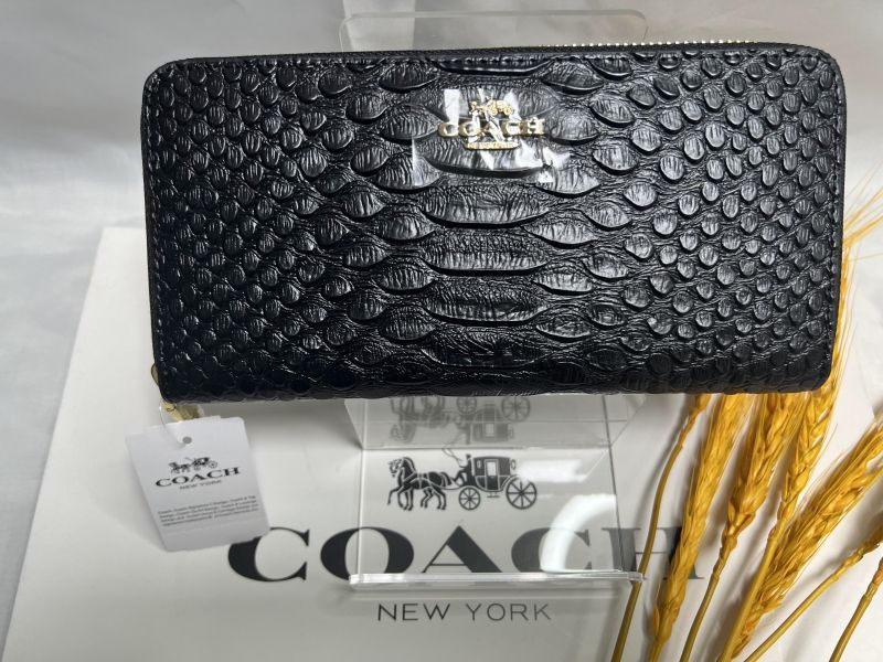 新品未使用品コーチCOACHブラックホワイト長財布男女問わず - 小物