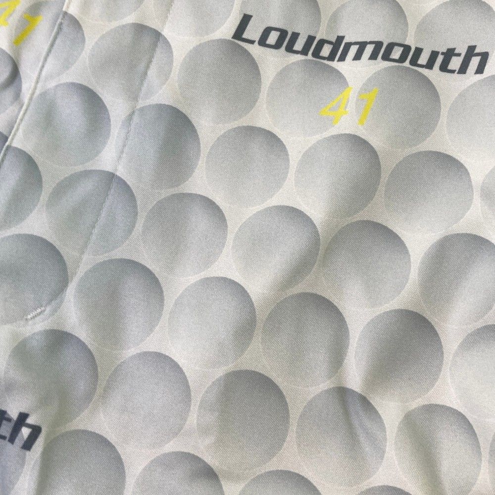 サイズ：XL LOUD MOUTH ラウドマウス  ロングパンツ ゴルフボール 総柄 ホワイト系 [240101415391] ゴルフウェア メンズ ストスト サイズ：XL LOUD MOUTH ラウドマウス ロングパンツ ゴルフボール