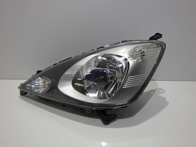 比較的 コーティング加工済 GE6|7 フィット 前期 左ヘッドライト HID P6869 7 バラスト付 250422035