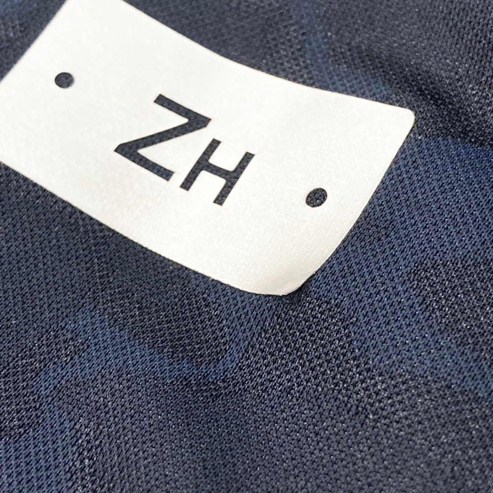 サイズ：2L ZERO HALLIBURTON ゼロハリバートン  半袖ポロシャツ カモフラ柄 ネイビー系 [240101440981] ゴルフウェア メンズ ストスト サイズ：2L ZERO HALLIBURTON ゼロハリバートン 半袖ポロシャツ