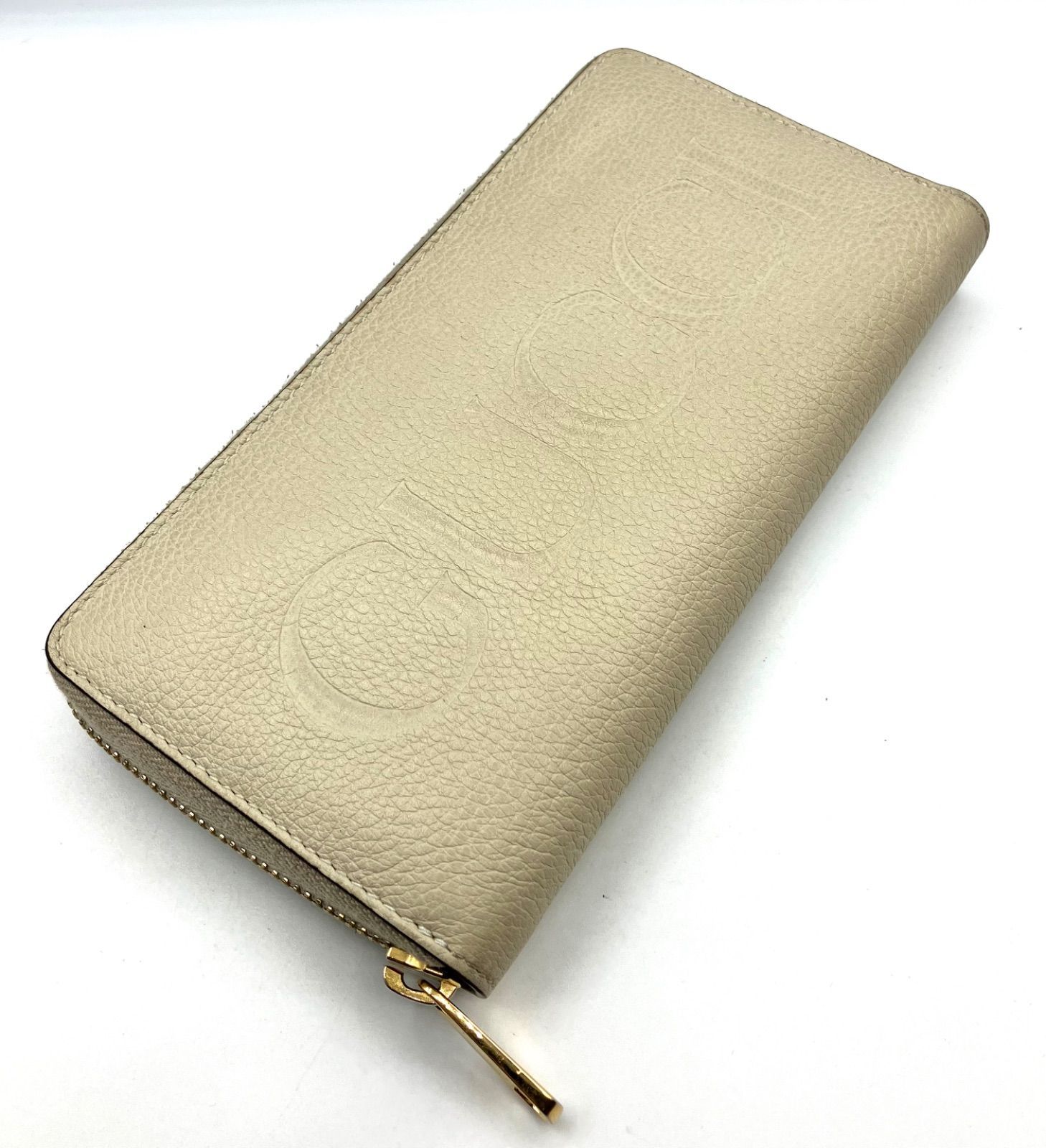 GUCCI グッチ エンボスロゴ ラウンドジップ 長財布 メンズ レザー 