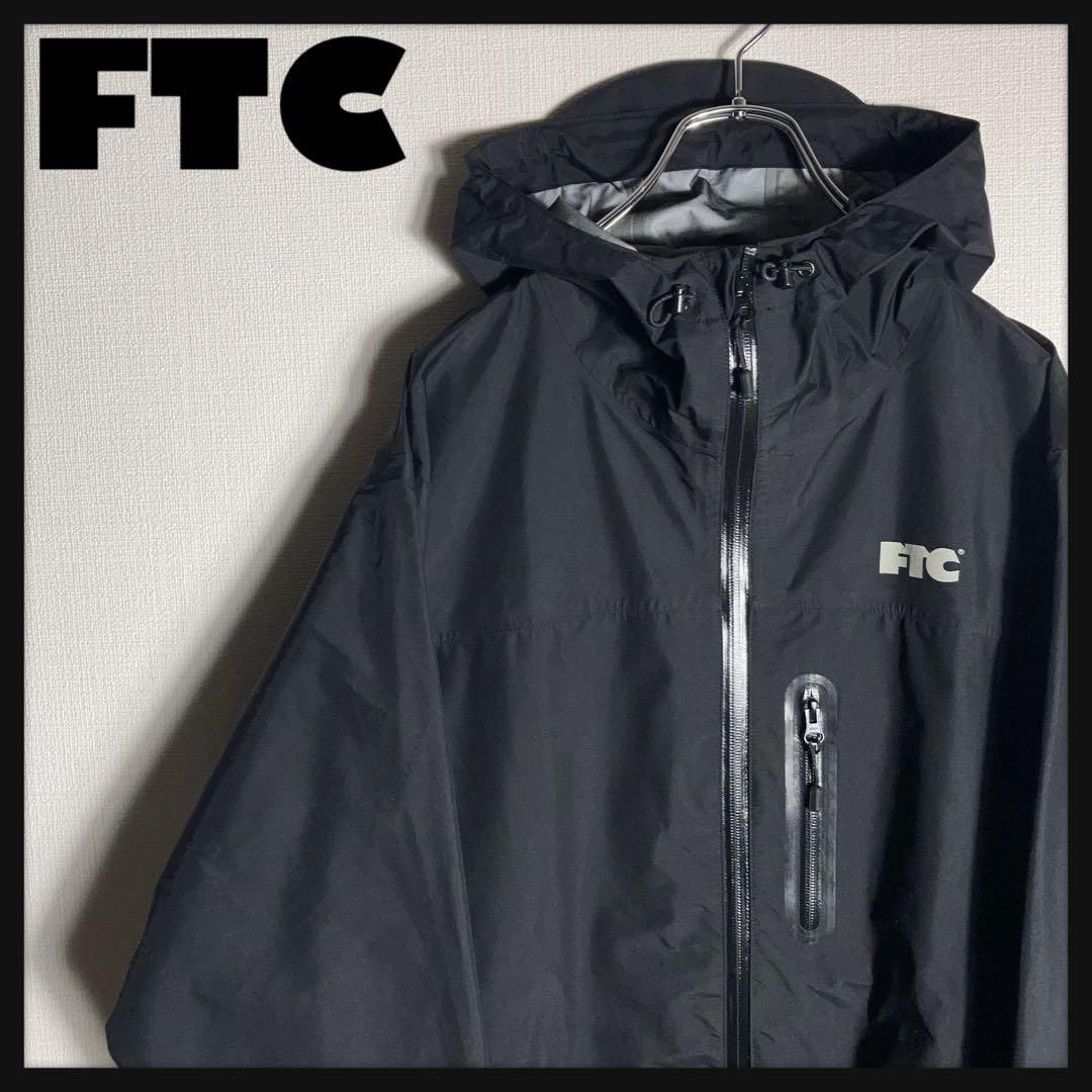 【美品】FTC マウンテンパーカー ワンポイントロゴ 黒 XL 美品】FTC マウンテンパーカー ワンポイントロゴ 黒 XL FTC