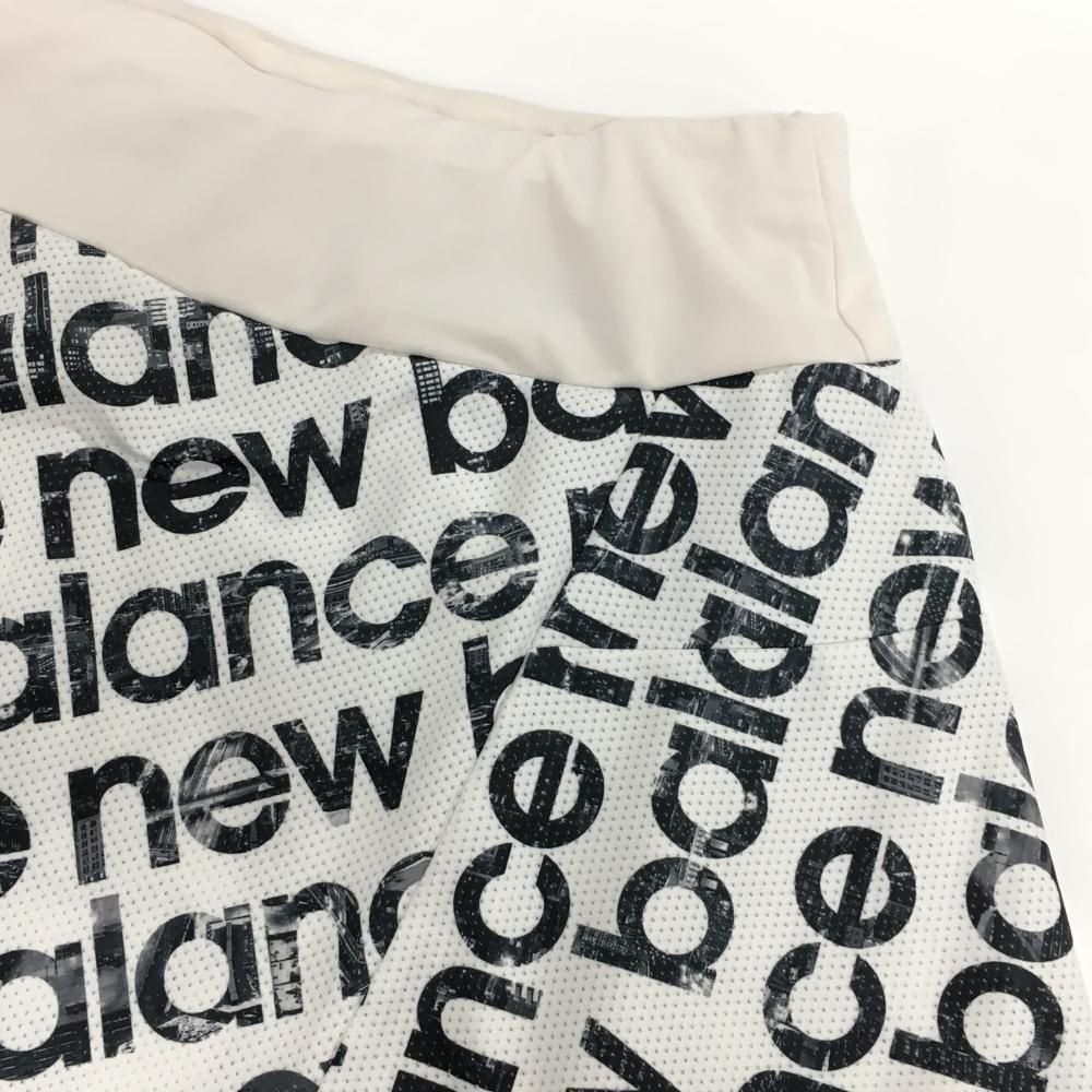 New Balance ロゴプリント スカート　　　Ｌ 超美品ニューバランスゴルフ スカート 白×黒 メッシュ地 ロゴ総柄