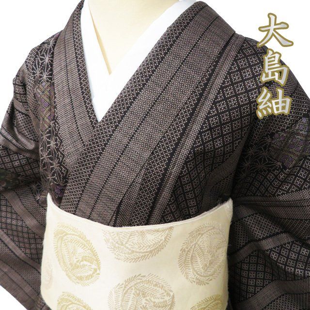 大島紬　茶泥　袷　正絹　花模様織り出し　身丈153裄62サイズ小さめ 大島紬 茶泥 袷 正絹 花模様織り出し 身丈153裄62サイズ小さめ